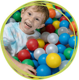 Boy in ball pool